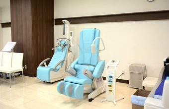 頚椎・腰椎能動型自動間欠牽引器